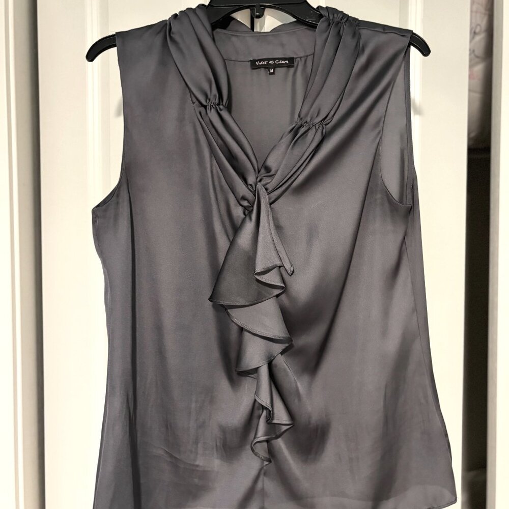 Silky, ruffle sleeveless top